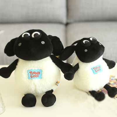 La peluche molle animale de moutons de Shaun de bande dessinée joue le blanc noir bourré chaud
