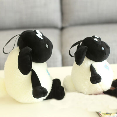 La peluche molle animale de moutons de Shaun de bande dessinée joue le blanc noir bourré chaud