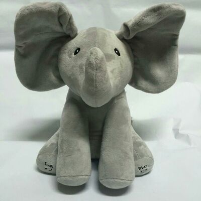Coup d'oeil gris jouets d'une peluche de musique de huer, jouet bourré électronique d'éléphant