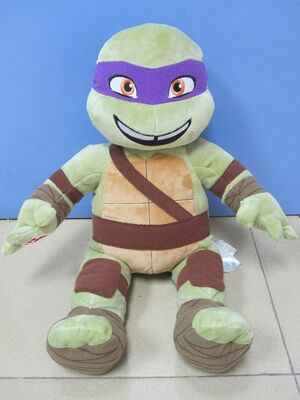 La grande bande dessinée adolescente de tortues de Ninja de mutant de Brown bourrée badine des jouets de peluche