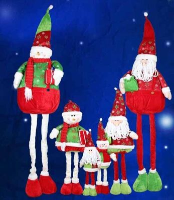 La grands poupée et bonhomme de neige de Santa avec des vacances de Noël de jambe de Streaching pour célèbrent la partie