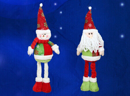 La grands poupée et bonhomme de neige de Santa avec des vacances de Noël de jambe de Streaching pour célèbrent la partie