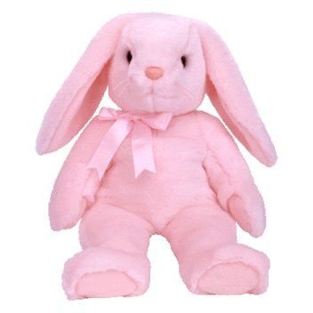 La poussée bourrée par pourpre de lapins de Pâques joue les peluches molles de vacances